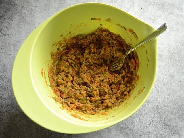 Loaf spice Ingredients mixed together in mixing bowl with fork 