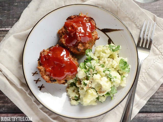 Plate with two Mini Garden Turkey Loaves with a side of potatoes 