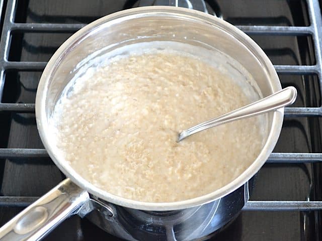Thickened Oat Bran in pot on stove top 