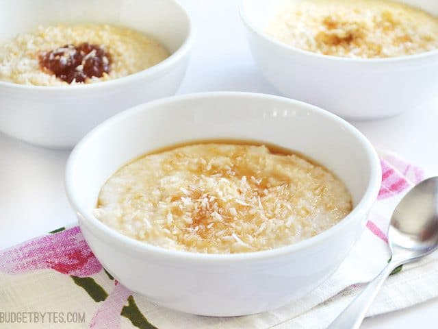 Side view of three bowls of Toasted Coconut Oat Bran