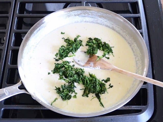 Add thawed and squeezed frozen Spinach to ricotta sauce