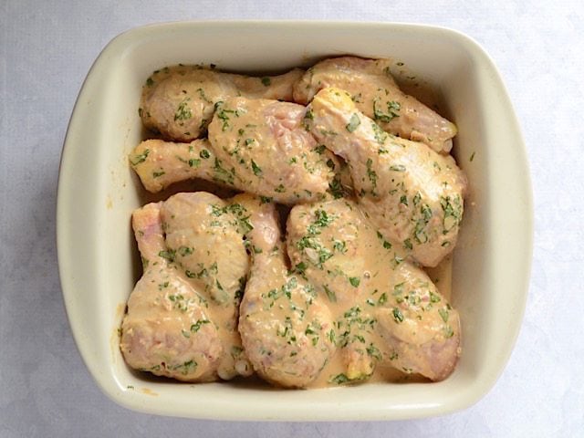 Marinated chicken in casserole dish ready to bake 