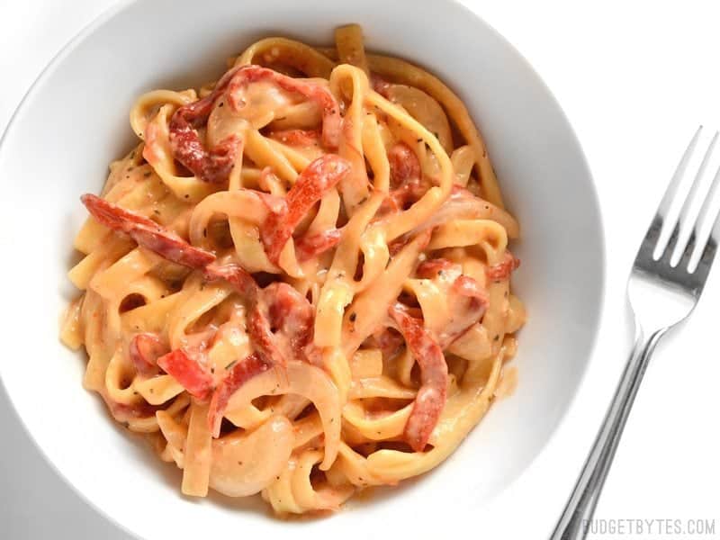 This smoky, sweet, and creamy One Pot Roasted Red Pepper Pasta cooks in one single pot and can be on the table in about 30 minutes. BudgetBytes.com