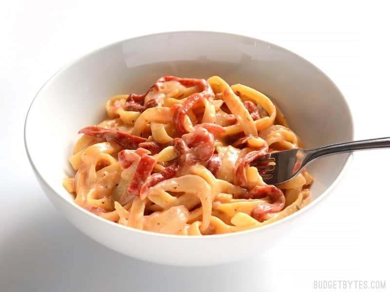 Side view of a bowl of One Pot Roasted Red Pepper Pasta 