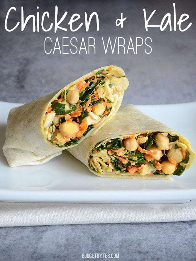 This easy Kale Chicken Caesar Wrap is a great no-cook, no-reheat lunch idea. A big deli-style wrap made at home for a LOT less money. Budetbytes.com A Kale Chicken Caesar Wrap cut in half, on a plate. Title text at the top.