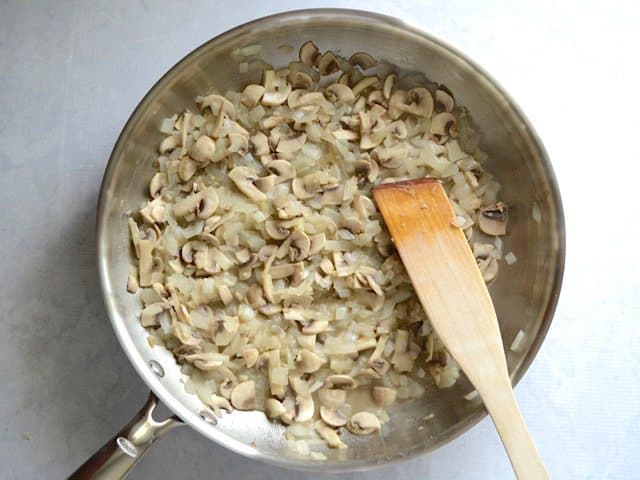 Sautéed Garlic, Onion, and Mushrooms in the skillet