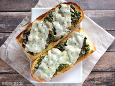 Spinach Mushroom and Swiss French Bread Pizza - BudgetBytes.com