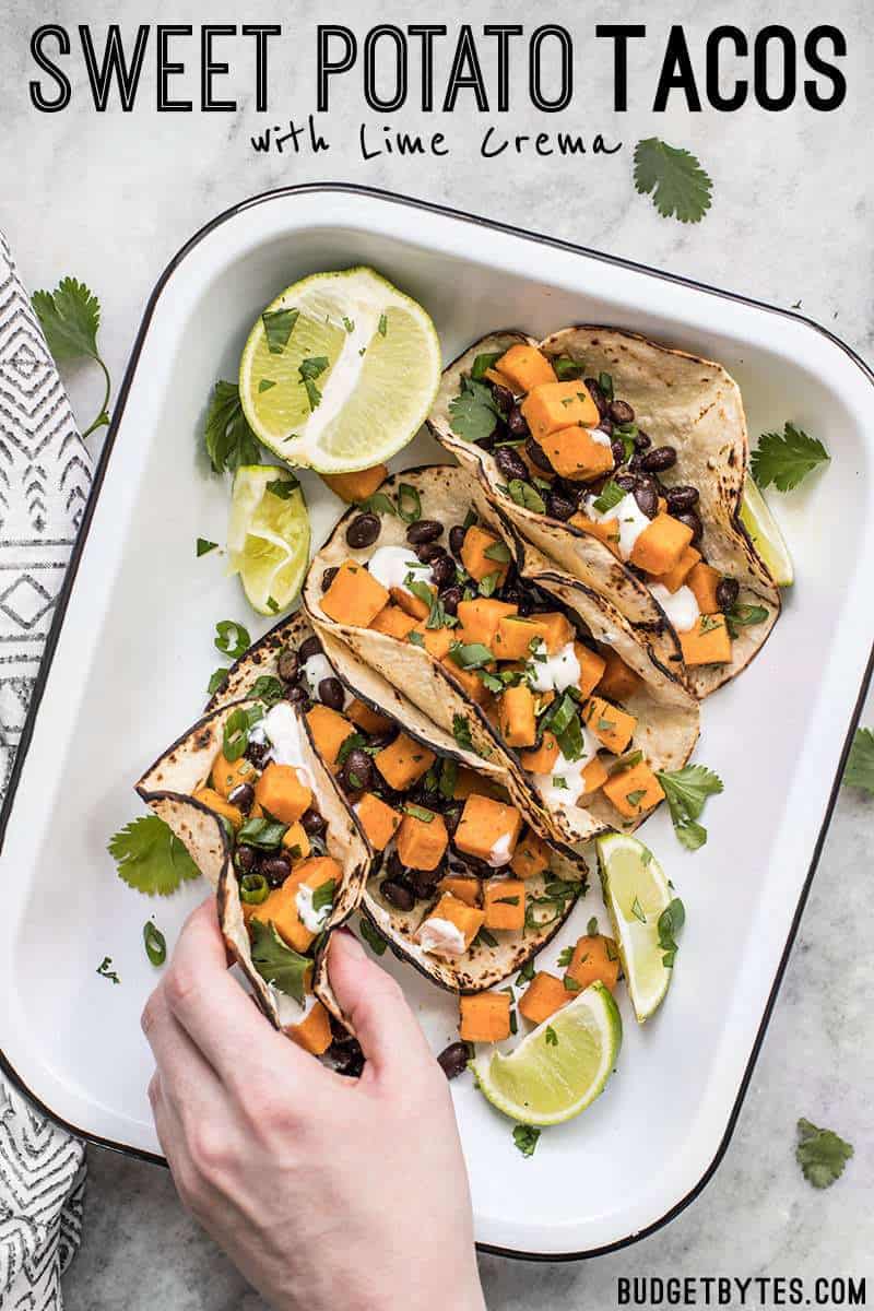 These light and refreshing Sweet Potato Tacos are filled with a simple sweet potato and black bean hash, and topped with a tangy lime crema. BudgetBytes.com