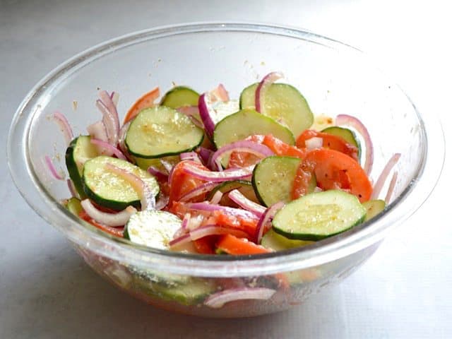 Cucumber Salad Stirred and Coated in Dressing