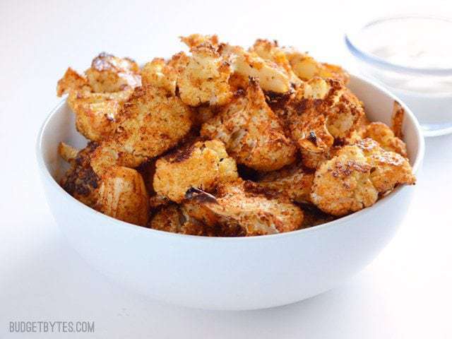 Side view of a bowl of Smoky Parmesan Roasted Cauliflower 