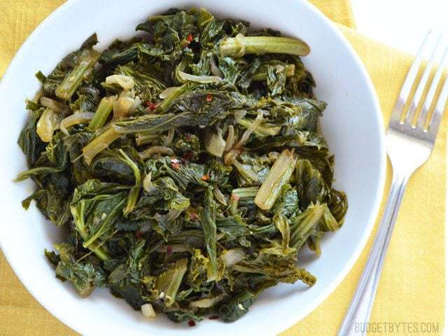 Close up overhead view of a bowl of Vegetarian Mustard Greens
