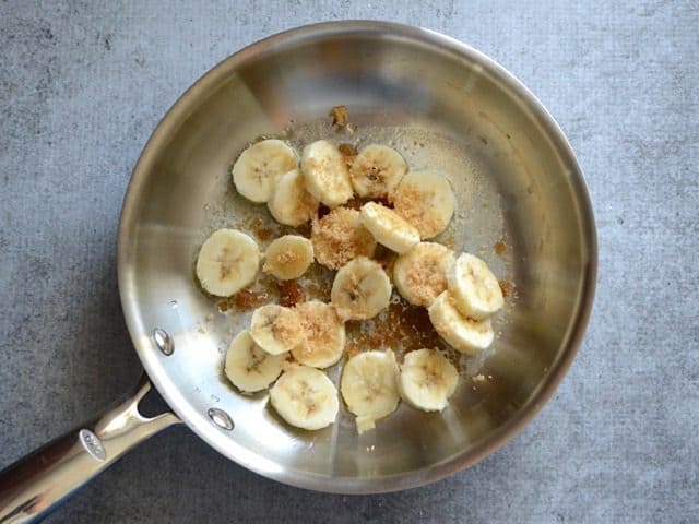 Melted Butter in a Skillet with Sliced Banana and Brown Sugar