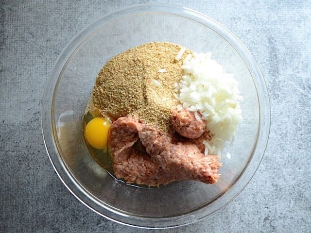 Skillet Meatball Ingredients in a glass mixing bowl