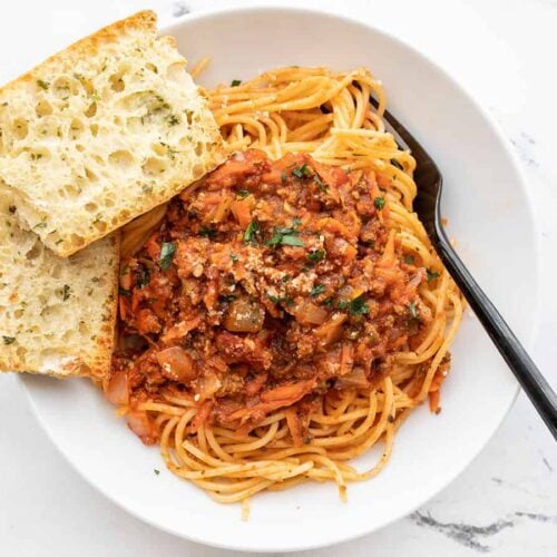 Overhead view of a bowl of spaghetti with hidden vegetable pasta sauce