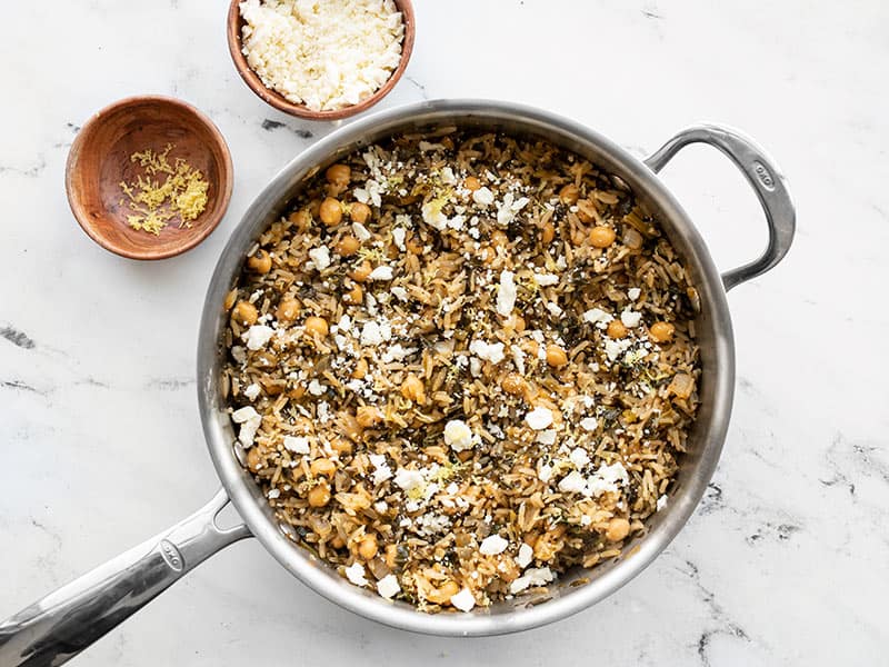 Spinach and Chickpea Rice Pilaf topped with lemon and feta