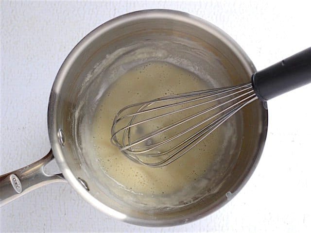 Whisking Simmering Flour and Butter in the sauce pot