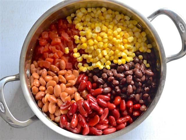 Tomatoes, Beans, and Corn added to the pot