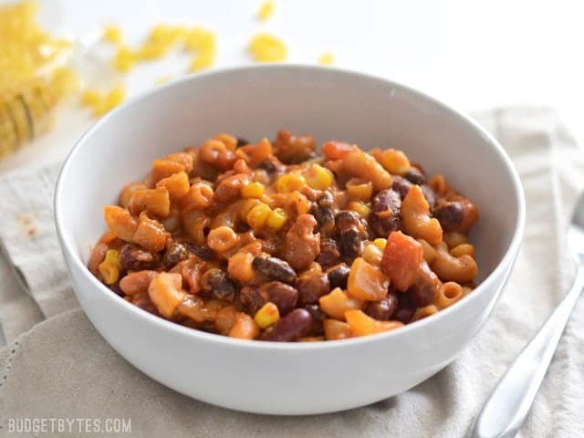 Side View of a bowl full of vegetarian chili mac and cheese