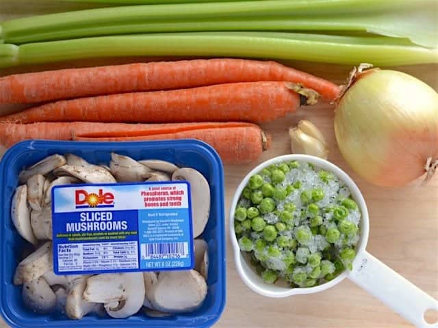 Whole Vegetables - celery, carrots, onion, mushrooms, garlic, and frozen peas