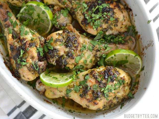Close up of Cilantro Lime Chicken Drumsticks in the baking dish
