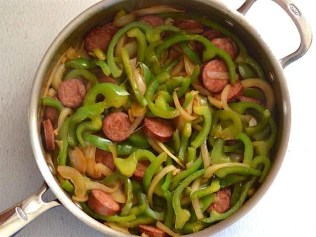 Wilted Peppers and Onions in the skillet with sausage