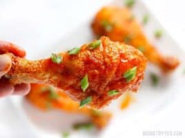 Crispy Baked Honey Sriracha Chicken Drumsticks with Homemade Honey Sriracha Wing Sauce - BudgetBytes.com