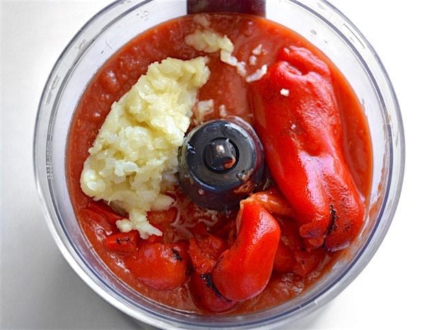 red peppers, tomatoes, garlic, and onion In Food Processor