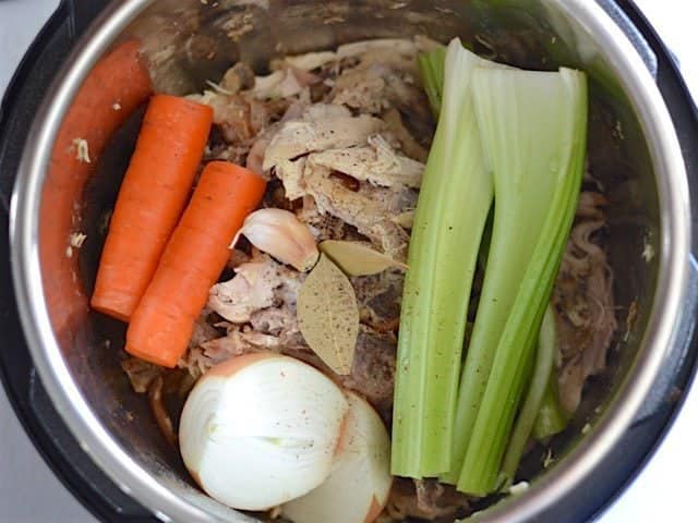 Onion, Carrot, Celery, Garlic, bay leaf, and pepper added to the Instant Pot