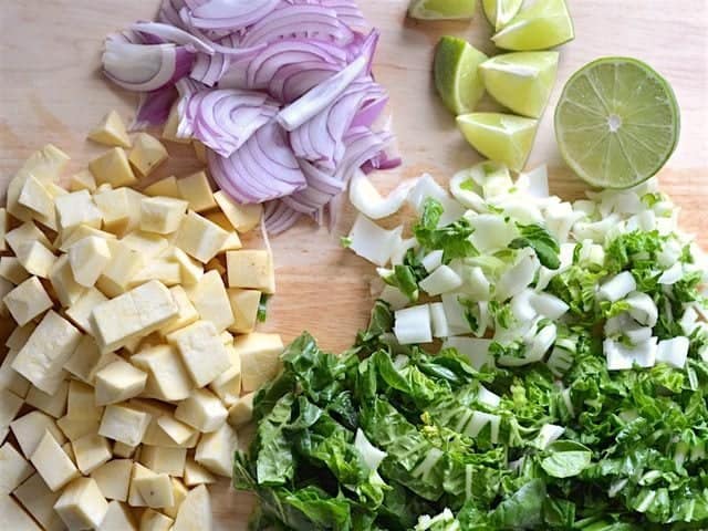 Chopped Vegetables for soup on a wooden cutting board