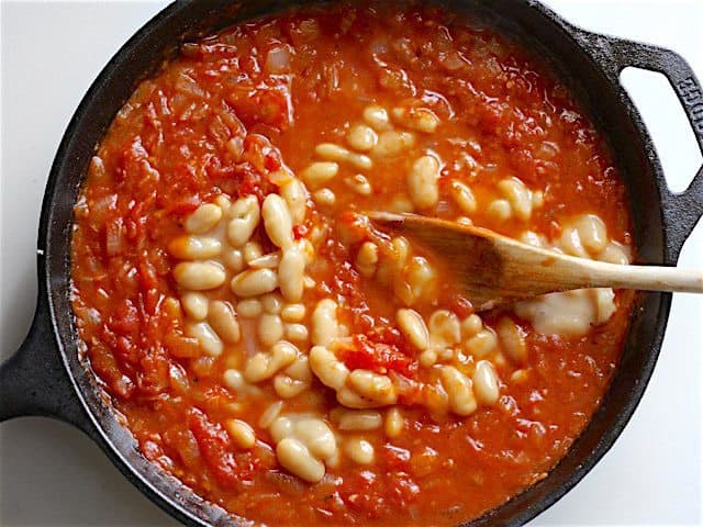 Stir Cannellini Beans into tomato sauce