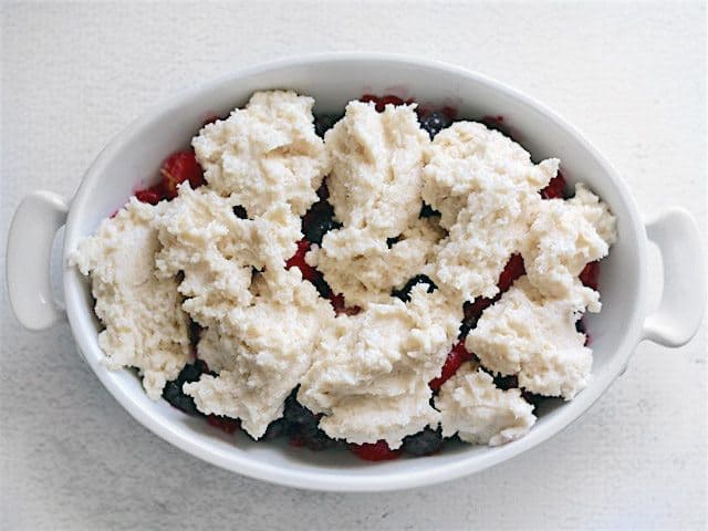 Sweet Biscuit Topping on Berries in the casserole dish