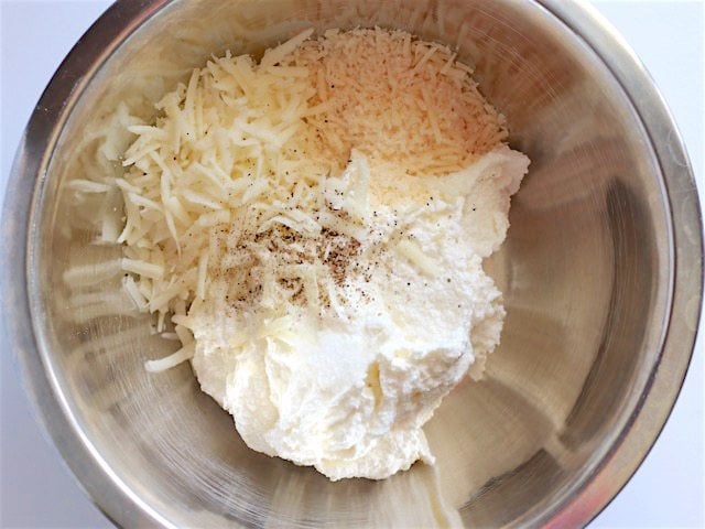Three Cheeses and seasoning in bowl