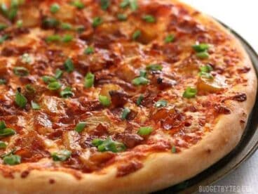 Bacon and Caramelized Pineapple Pizza is everything your sweet and salty dreams are made of. BudgetBytes.com