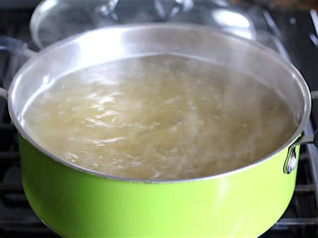 Spaghetti boiling in a large pot of water