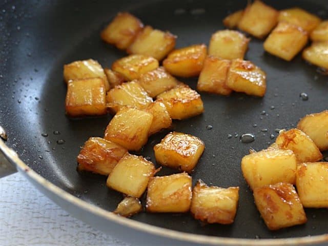 Close up of the Caramelized Pineapple Chunks in the skillet