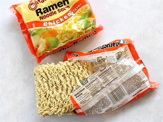 Ramen Noodles in their package, one partially open
