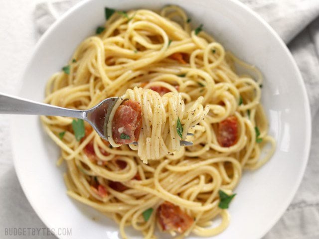 Spaghetti Carbonara is fast and easy dinner with just a few ingredients and a luxuriously creamy sauce. BudgetBytes.com