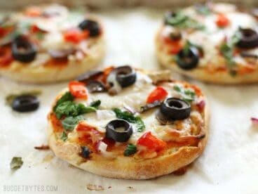 Freezer Ready Mini Pizzas are an easy and inexpensive snack to keep on hand in your freezer. BudgetBytes.com