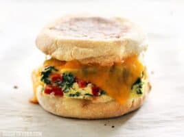 Veggie Packed Freezer Ready Breakfast Sandwiches are a filling, delicious, and microwavable make ahead breakfast for busy mornings. BudgetBytes.com