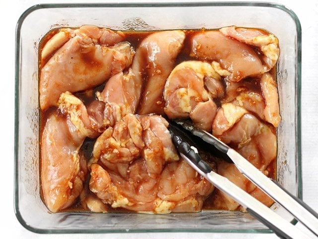 Marinate Chicken thighs in a shallow dish, glass casserole dish