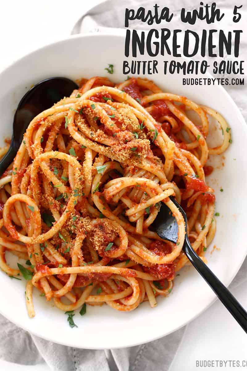 Overhead view of a bowl full of Pasta with 5 Ingredient Butter Tomato Sauce, title text at the top