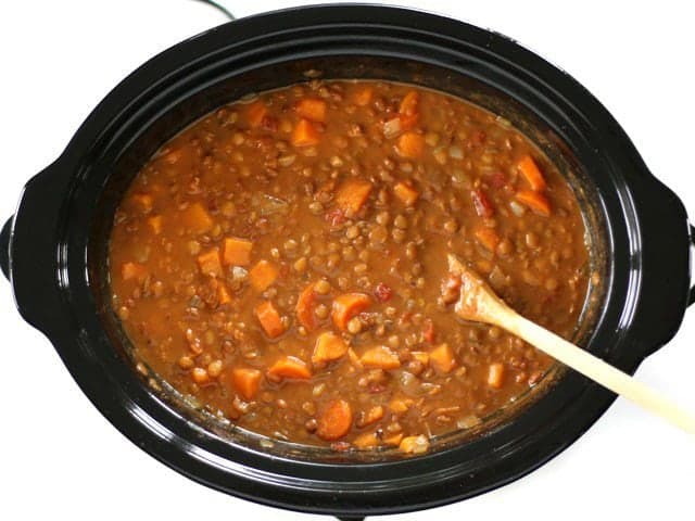 Add Coconut Milk to Slow Cooked Curried Lentils