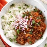 Close-up of coconut curry lentils in a bowl.