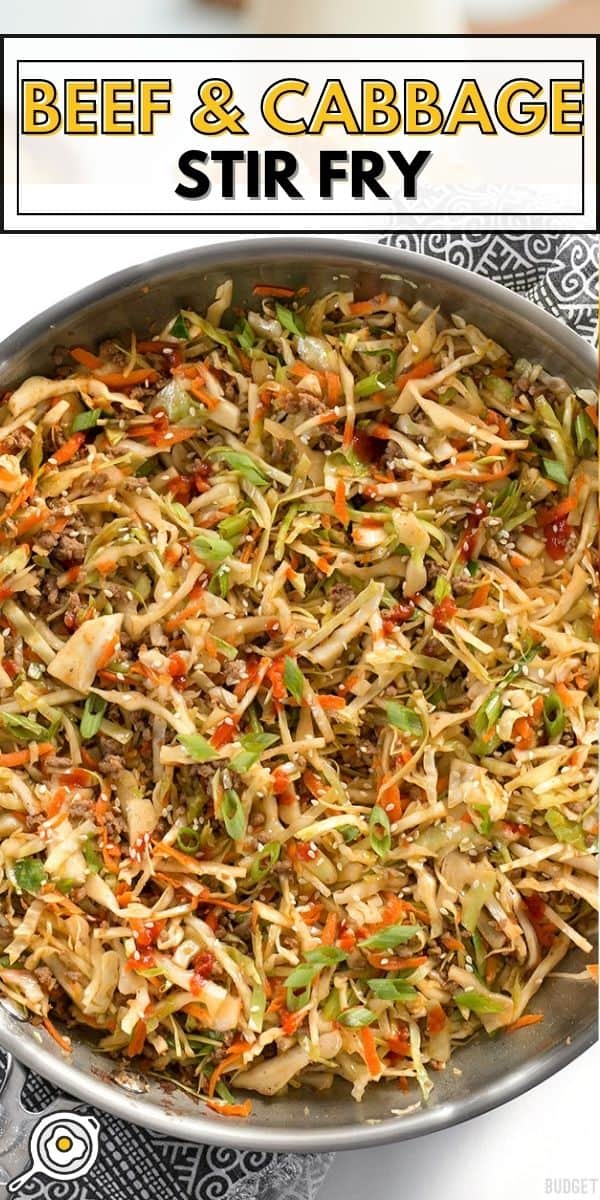 Overhead view of a skillet full of beef and cabbage stir fry.