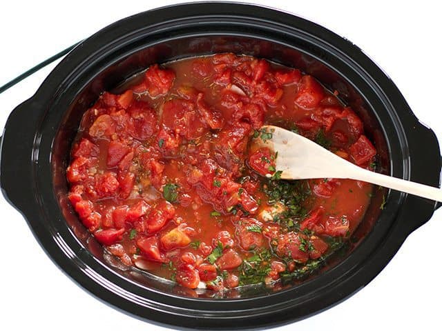 Diced Tomatoes and Parsley added to slow cooker 