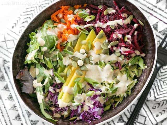 Top view od a Purple Power Bowl with dressing 