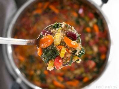 Garden Vegetable Quinoa Soup is a low calorie, high fiber, flavor packed meal perfect for your weekend meal prep. BudgetBytes.com