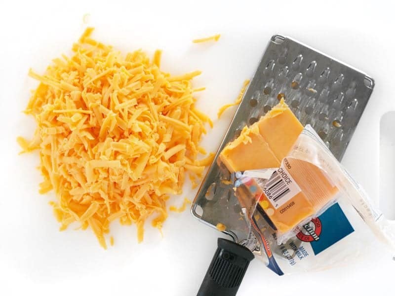 Shredded Cheddar Cheese with cheese grater