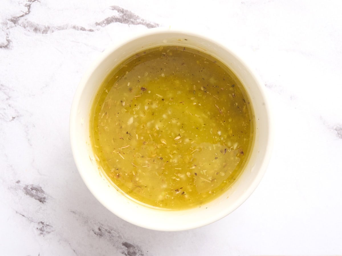 Lemon garlic dressing in a bowl.