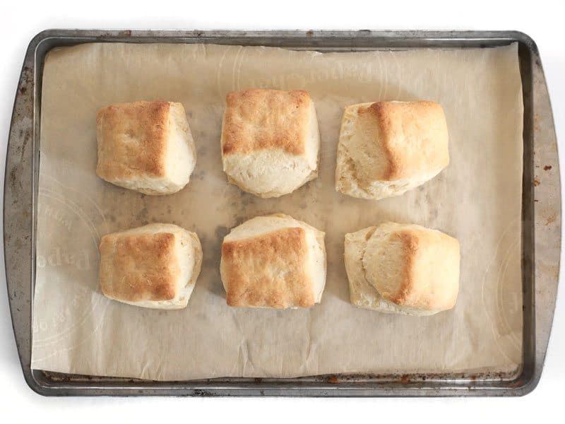 Baked Freezer Biscuits on a parchment lined baking sheet